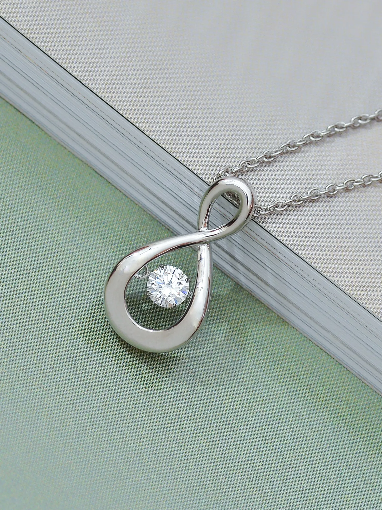 Dancing American Diamond Infinity Pendant In 925 Silver