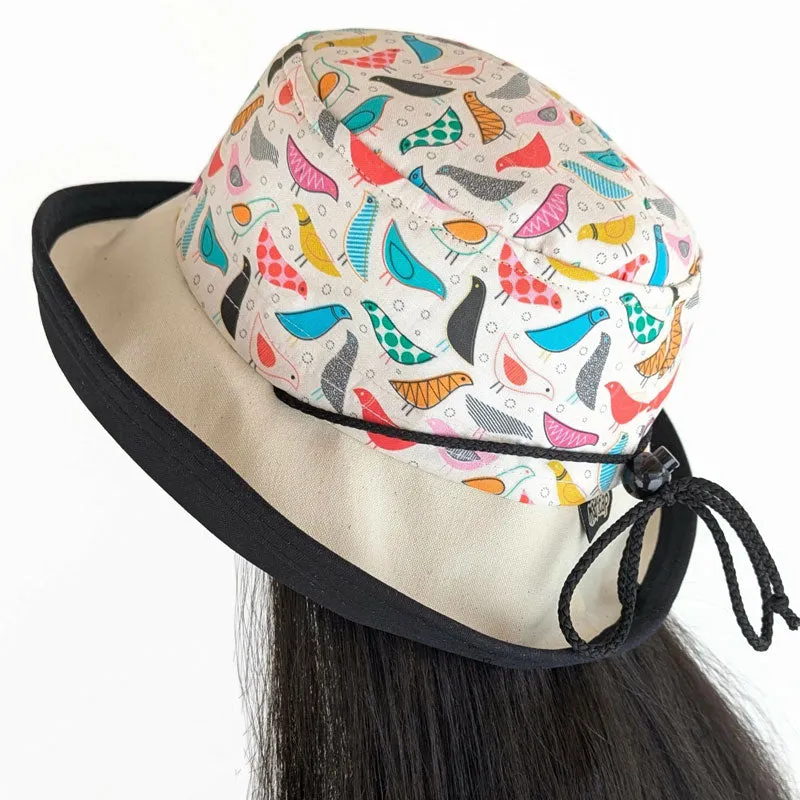 Sunblocker UV summer sun hat with wide brim, artsy birds print, adjustable fit