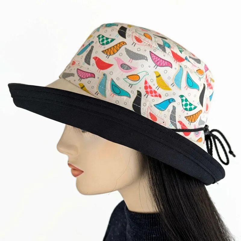 Sunblocker UV summer sun hat with wide brim, artsy birds print, adjustable fit